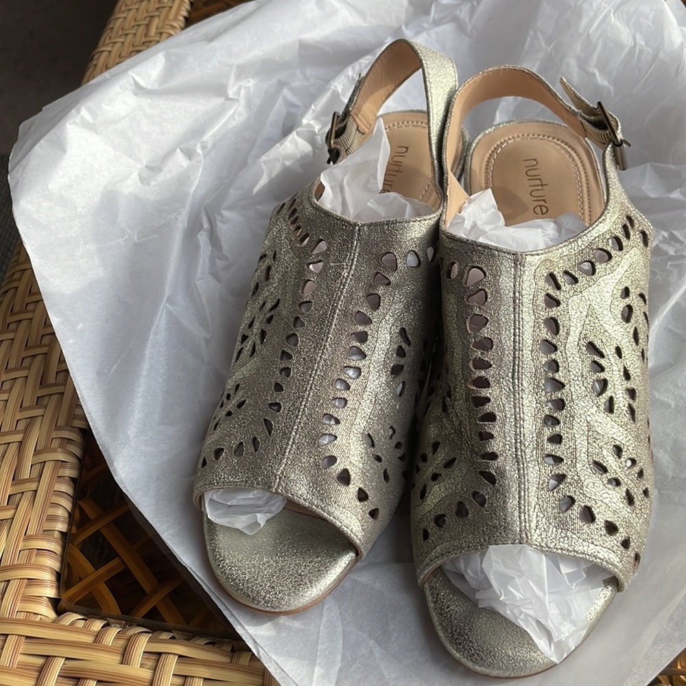 Nurture women's Sandals gold size 10 heel  is 1 1/2” leather upper and liner